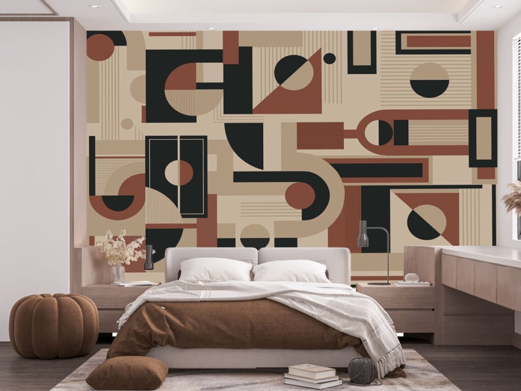 Modern geometric abstract wallpaper with terracotta, beige, black and brown shapes creating a stylish bedroom feature wall