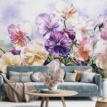 Floral wallpaper featuring large watercolor flowers in purple, pink, peach and cream