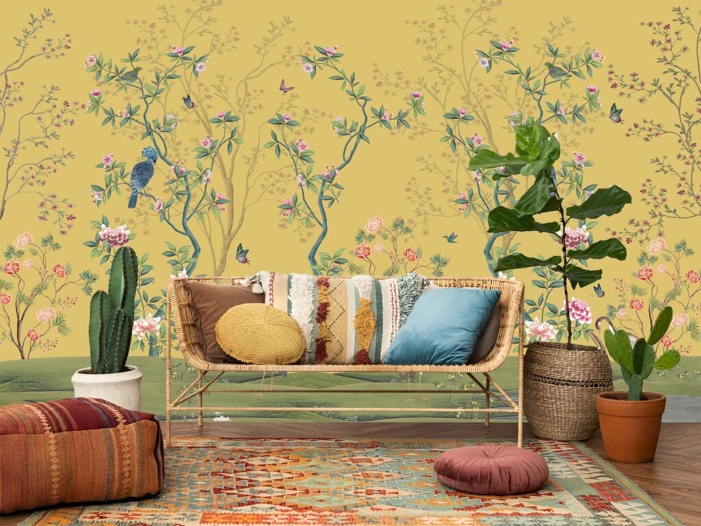 Luxury floral bird wallpaper featuring Chinoiserie birds, flowering branches, butterflies, and botanical artwork on a mustard yellow background for elegant living room interiors.