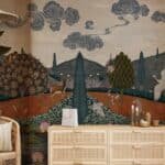 Luxury landscape wallpaper featuring deer, birds, lush trees, rolling hills, and artistic clouds for modern living room interiors.